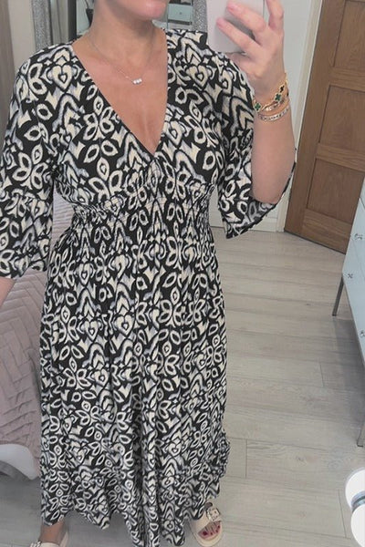 Frida™ - Stilvolles Kleid mit V-Ausschnitt und trendigem Druck